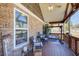Relaxing porch with seating, a swing, and scenic views at 1603 Drowning Creek Rd, Dacula, GA 30019