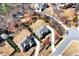 Aerial view of a home with long driveway and well-manicured landscaping at 2196 Abbott Dr, Buford, GA 30519