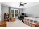 Cozy bedroom with window and desk at 2196 Abbott Dr, Buford, GA 30519