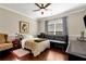 Bedroom featuring a full size bed, ceiling fan, and natural light at 2196 Abbott Dr, Buford, GA 30519