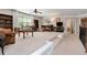 Carpeted bonus room is spacious and bright, featuring large windows and staircase entrance at 2196 Abbott Dr, Buford, GA 30519