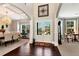 Grand foyer with hardwood floors and double doors, creating an elegant entrance to the home at 2196 Abbott Dr, Buford, GA 30519