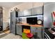 Organized garage featuring storage cabinets, a workbench, and ample space for vehicles and projects at 2196 Abbott Dr, Buford, GA 30519