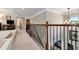 Upstairs hallway showcasing the home's open concept and natural light at 2196 Abbott Dr, Buford, GA 30519