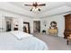 Open main bedroom with a ceiling fan, private ensuite bath and an inviting decor at 2196 Abbott Dr, Buford, GA 30519