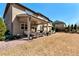 Inviting covered patio with comfortable seating, perfect for outdoor relaxation and entertainment at 2196 Abbott Dr, Buford, GA 30519