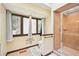 Bathroom features include a walk-in shower, tile floor and natural light at 4859 Clark Lake Nw Way, Acworth, GA 30102