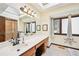 Bright bathroom with a dual sink vanity, lots of natural light, and a walk-in shower at 4859 Clark Lake Nw Way, Acworth, GA 30102