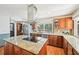 Well-equipped kitchen features stainless steel appliances, granite countertops, and custom wood cabinetry at 4859 Clark Lake Nw Way, Acworth, GA 30102