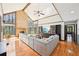 Bright and spacious living room with vaulted ceilings, hardwood floors, and a stunning brick fireplace at 4859 Clark Lake Nw Way, Acworth, GA 30102