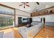 Open-concept living room with vaulted ceilings, skylights, and a second-story balcony at 4859 Clark Lake Nw Way, Acworth, GA 30102