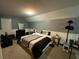Bedroom with bed, desk, and ample space at 1162 Mason Lee, Loganville, GA 30052