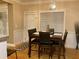 A dining room featuring a table with seating for four and natural light at 1162 Mason Lee, Loganville, GA 30052