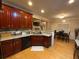Well-appointed kitchen with granite countertops, stainless steel appliances, and ample cabinet space at 1162 Mason Lee, Loganville, GA 30052