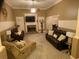 Spacious living area with fireplace, mantel, and comfortable seating arrangement for relaxation and entertainment at 1162 Mason Lee, Loganville, GA 30052