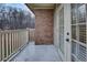The balcony features a brick facade and a railing, perfect for enjoying the outdoors at 1910 Cedar Glenn Way # 4401, Atlanta, GA 30339