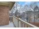 Balcony view overlooking a wooded area at 1910 Cedar Glenn Way # 4401, Atlanta, GA 30339