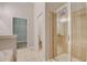This bathroom includes a stand up shower, toilet, and walk-in closet at 1910 Cedar Glenn Way # 4401, Atlanta, GA 30339