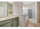 Bright bathroom features a double sink vanity, soaking tub, and separate shower for a luxurious experience at 1910 Cedar Glenn Way # 4401, Atlanta, GA 30339