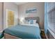 Comfortable bedroom with natural light from windows and a spacious closet at 1910 Cedar Glenn Way # 4401, Atlanta, GA 30339