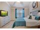 Comfortable bedroom with TV and lots of light from the window at 1910 Cedar Glenn Way # 4401, Atlanta, GA 30339