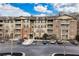 View of the building exterior showcasing its architectural style and parking area at 1910 Cedar Glenn Way # 4401, Atlanta, GA 30339