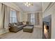 Comfortable living room featuring fireplace and large windows at 1910 Cedar Glenn Way # 4401, Atlanta, GA 30339