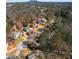 Aerial view of a property in a wooded neighborhood at 23 Peggy Nw Ct, Marietta, GA 30064