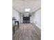 Finished basement featuring wood-look floors and a modern entertainment center at 23 Peggy Nw Ct, Marietta, GA 30064