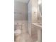 This bathroom has a toilet, and a pedestal sink, with extra storage at 23 Peggy Nw Ct, Marietta, GA 30064
