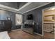 The bedroom features decorative paint, TV, a window, and a mirrored cabinet at 23 Peggy Nw Ct, Marietta, GA 30064