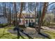 Charming two-story home with landscaped yard, front porch, and a combination of brick and siding at 23 Peggy Nw Ct, Marietta, GA 30064