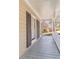 Cozy front porch featuring a gray painted floor, gray shutters, and white trim along the porch at 23 Peggy Nw Ct, Marietta, GA 30064