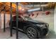 Attached garage featuring a vehicle and storage at 23 Peggy Nw Ct, Marietta, GA 30064