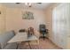 This office space offers a desk, comfortable seating, and natural light at 23 Peggy Nw Ct, Marietta, GA 30064