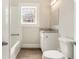 Bright bathroom with updated granite vanity, sleek fixtures, and a window for natural light at 495 Hutchens Se Rd, Atlanta, GA 30354