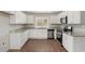 Modern kitchen featuring granite countertops, stainless steel appliances, and ample cabinet space at 495 Hutchens Se Rd, Atlanta, GA 30354