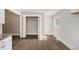 Kitchen area with hardwood floors, open layout, stainless appliances, and granite countertops at 495 Hutchens Se Rd, Atlanta, GA 30354