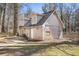 Detached outbuilding featuring a brick exterior and three double hung windows at 495 Hutchens Se Rd, Atlanta, GA 30354