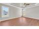 Spacious bedroom with hardwood floors and a tray ceiling at 720 Goldenrod Way, Norcross, GA 30093