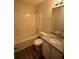 Well lit bathroom featuring a shower and tub combination and a granite vanity at 184 Brandywine Dr, Douglasville, GA 30134