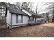 Side view of a well maintained single story home with gray siding and trim at 184 Brandywine Dr, Douglasville, GA 30134