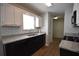 Updated kitchen with granite countertops and stainless steel appliances at 184 Brandywine Dr, Douglasville, GA 30134
