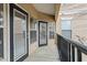 Long balcony with view of complex interior and multiple windows with blinds at 1850 Cotillion Dr # 3222, Atlanta, GA 30338