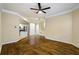 Spacious living room featuring hardwood floors and an open concept to the kitchen at 1850 Cotillion Dr # 3222, Atlanta, GA 30338