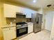 Well-appointed kitchen featuring stainless steel appliances and granite countertops at 3466 Carriage Chase Rd, Atlanta, GA 30349