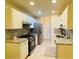 Bright kitchen with modern appliances, cabinetry and countertops at 3466 Carriage Chase Rd, Atlanta, GA 30349