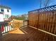 Private deck with wood railings offers a cozy outdoor space, perfect for relaxation and entertaining at 522 Healy Dr # 66, Cumming, GA 30040