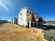 Modern townhome featuring a deck and an attached garage at 522 Healy Dr # 66, Cumming, GA 30040
