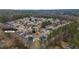 Aerial view of a residential neighborhood with well-maintained homes and mature trees, offering a serene living environment at 5706 Spring Mill Cir, Lithonia, GA 30038